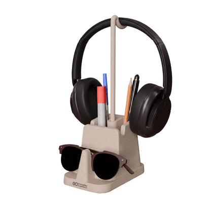 eo Desk Station Lite pen stand holding headphones, pens and sunglasses on white